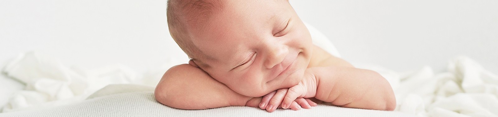 bigstock-Newborn-Baby-Boy-Sleeping-On-A-320995450.jpg